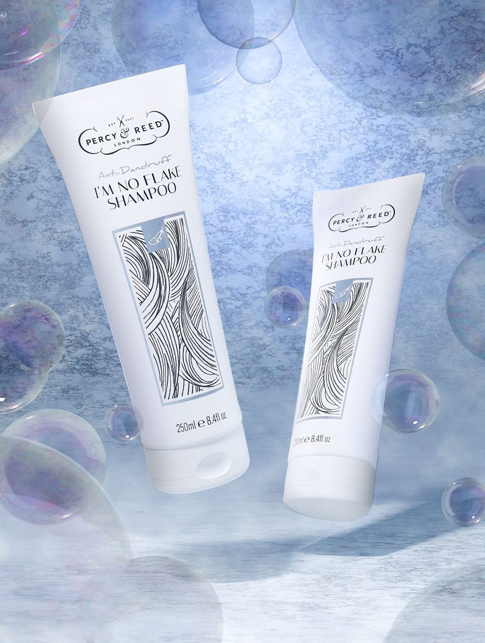CGI render of shampoo and conditioner tubes