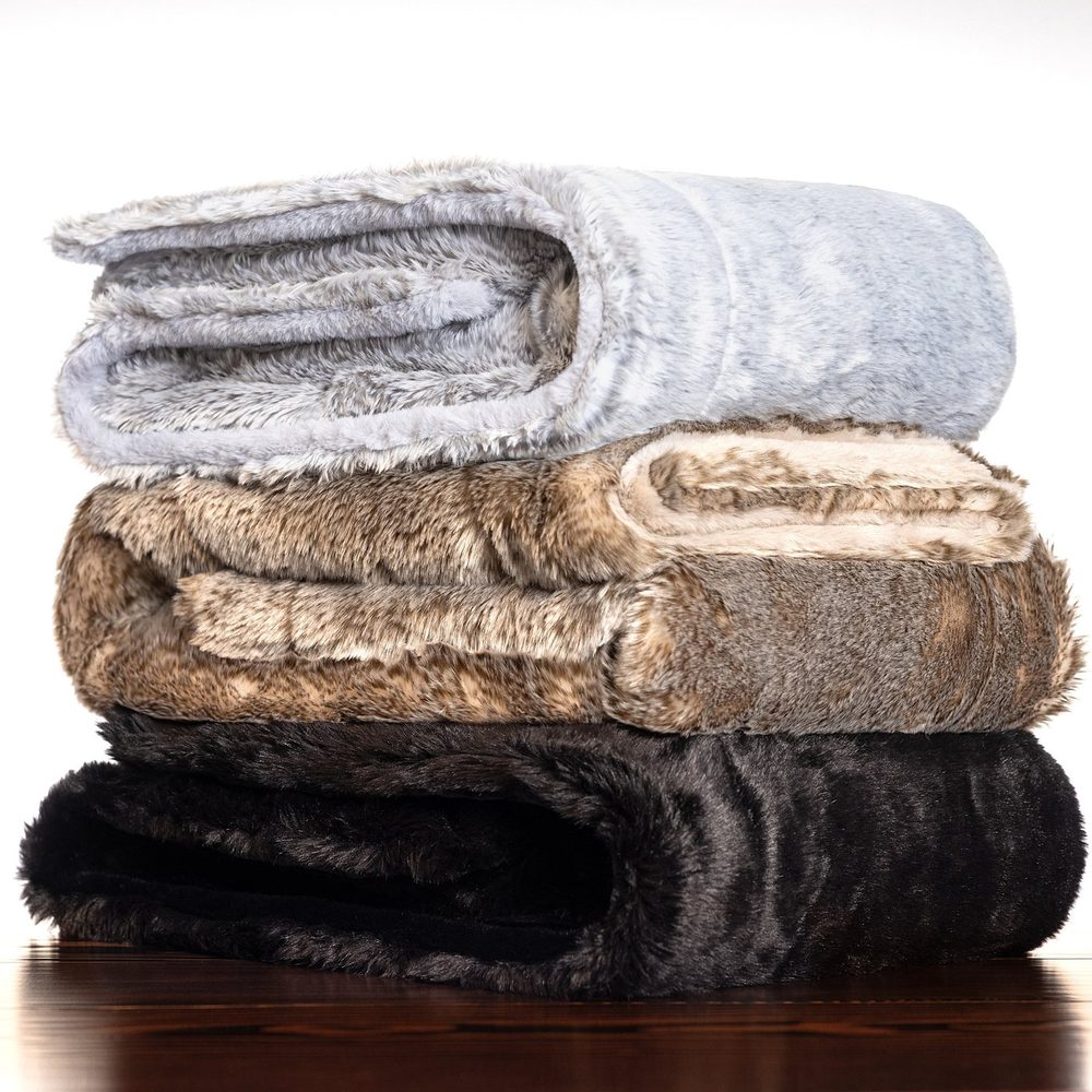 Stack of folded faux-fur blankets