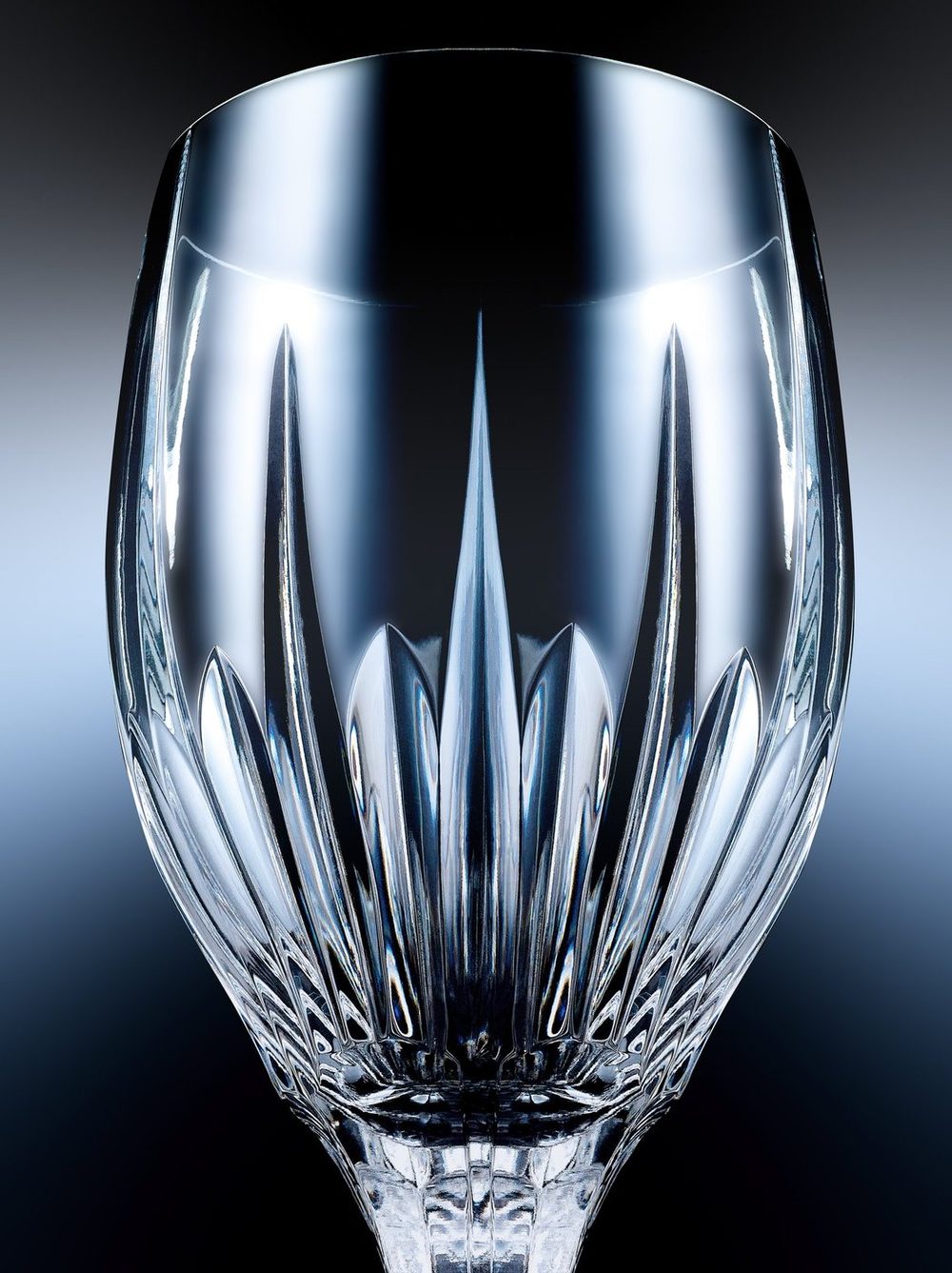 Cut crystal glass on a dark gradient