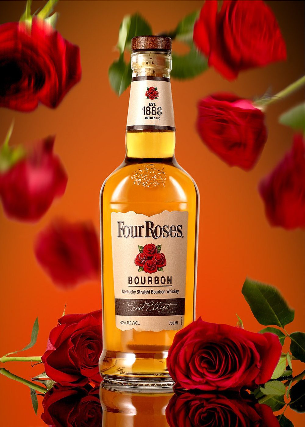 Four Roses bourbon bottle with falling red roses